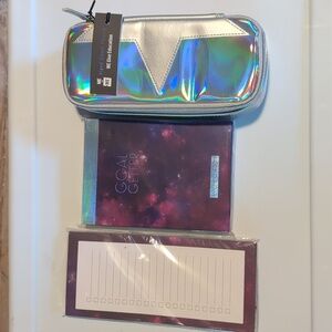 Me to We notepad and pencil pouch